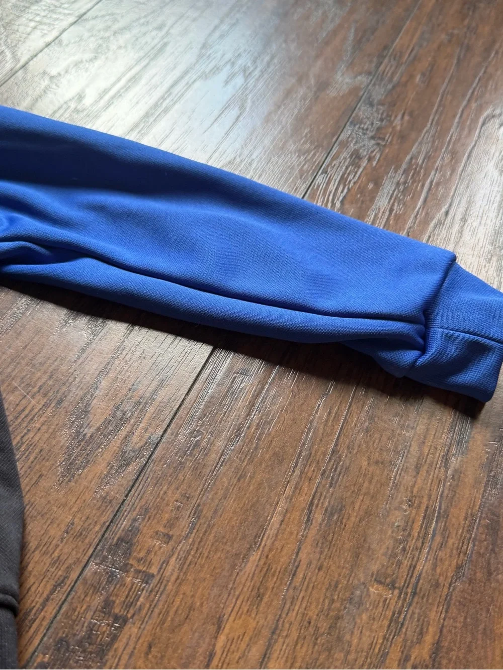 Nike Black Hoodie with Blue Sleeves and White Logo
